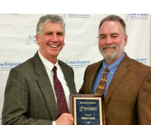 Brian Goetz receives his award from David Miller, President-Elect of NEWWA