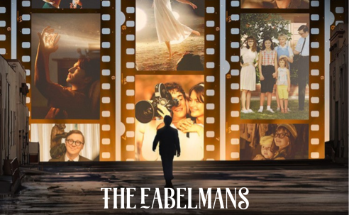 The Fabelmans Man in front of movie screen with film clips on screen